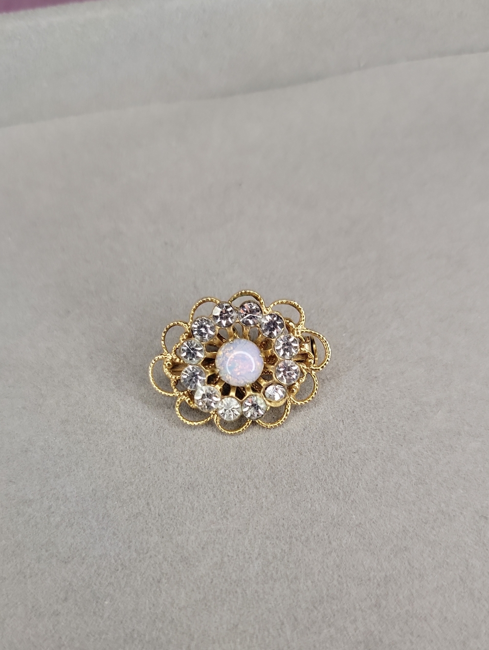 Vintage Filigree Cluster Brooch With White Opal Cabochon And Rhinestone Halo